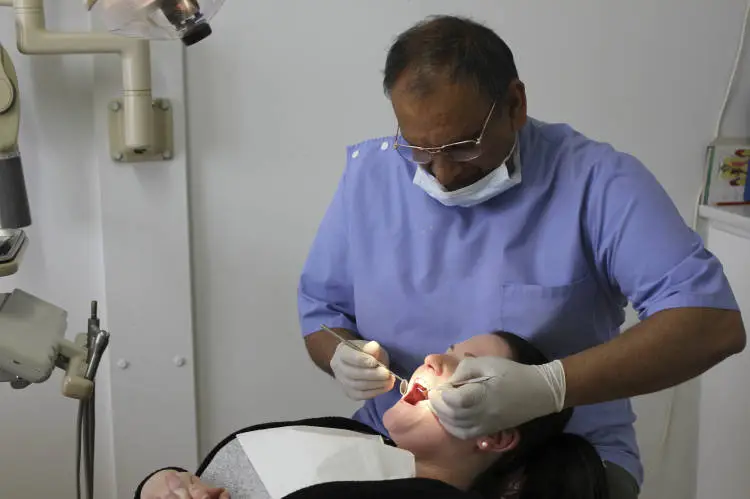 Dentist Dhiru (Pat) Kika in his surgery, 2015
