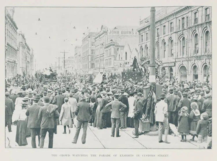 The crowd watching the parade of exhibits in Customs Street