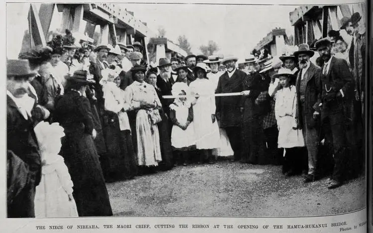 The niece of Nireaha, the Maori chief, cutting the ribbon at the opening of the Hamua-Hukanui bridge