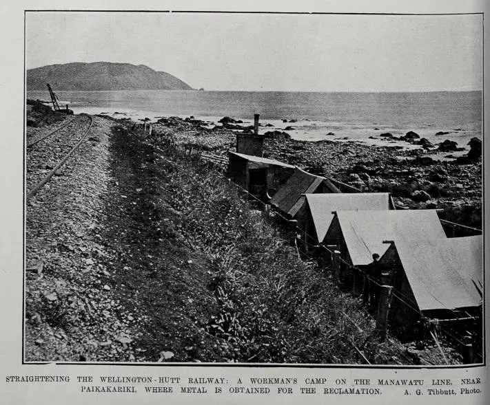 STRAIGHTENING THE WELLINGTON- HUTT RAILWAY: A WORKMAN'S CAMP ON THE MANAWATU LINE, NEAR PAIKAKARIKI, WHERE METAL IS OBTAINED FOR THE RECLAMATION