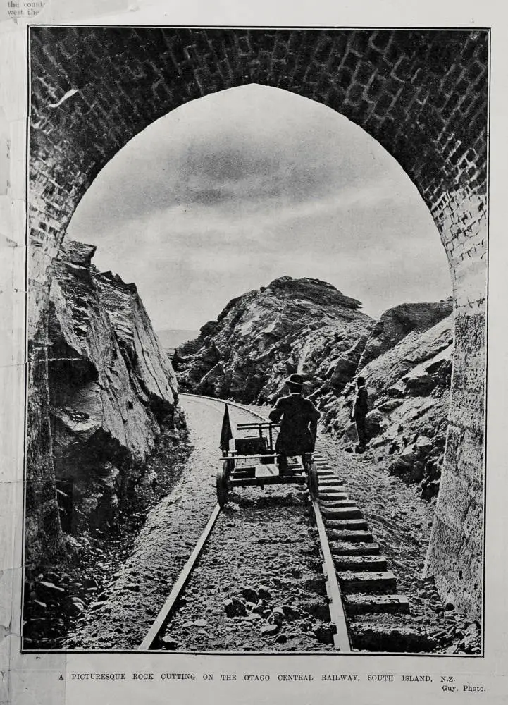 A PICTURESQUE ROCK CUTTING ON THE OTAGO CENTRAL RAILWAY, SOUTH ISLAND, N.Z.