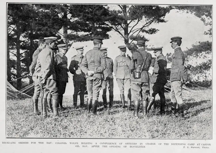 RECEIVING ORDERS FOR THE DAY: COLONEL WOLFE HOLDING A CONFERENCE OF OFFICERS IN CHARGE OF THE DEFENDING CAMP AT CASTOR OIL BAY, AFTER THE OPENING OF HOSTILITIES