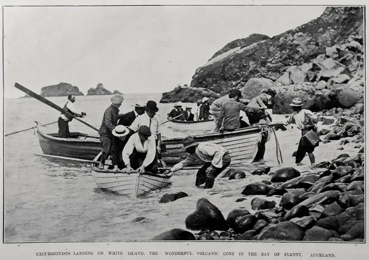 EXCURSIONISTS LANDING ON WHITE ISLAND, THE WONDERFUL VOLCANIC CONE IN THE BAY OF PLENTY, AUCKLAND