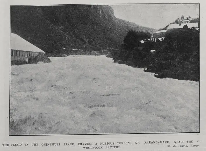 The flood in the Ohinemuri River, Thames: a furious torrent at Karangahake, near the old Woodstock Battery