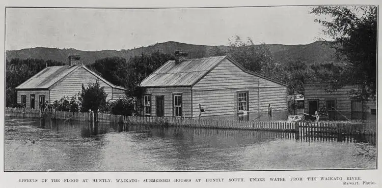EFFECTS OF THE FLOOD AT HUNTLY, WAIKATO: SUBMERGED HOUES AT HUNTLY SOUTH, UNDER WATER FROM THE WAIKATO RIVER