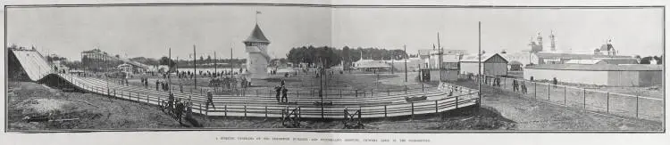 A STRIKING PANORAMA OF THE EXHIBITION BUILDING AND WONDERLAND. SHOWING VICTORIA LAKE IN THE BACKGROUND