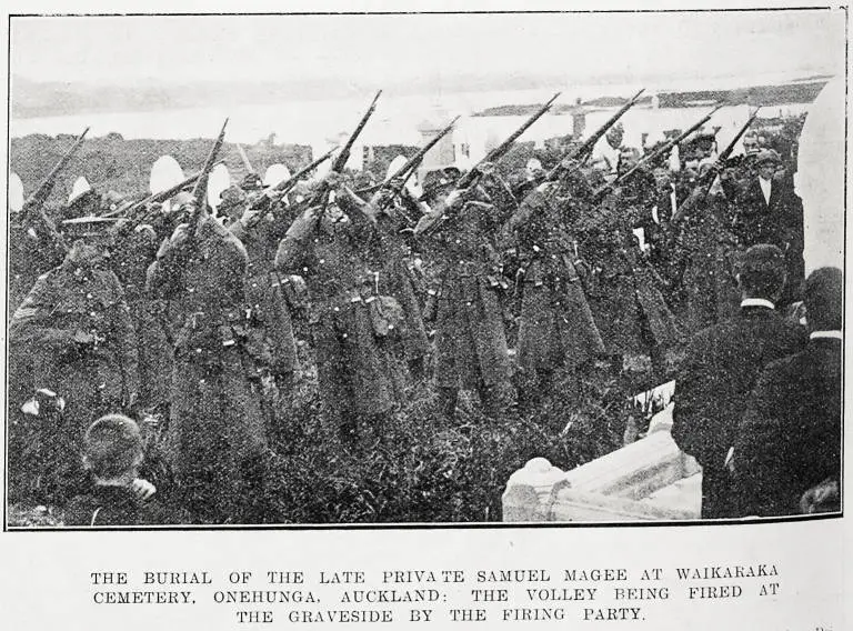 The burial of the late Private Samuel Magee at Waikaraka Cemetery, Onehunga, Auckland: the volley being fired at the graveside by the firing party