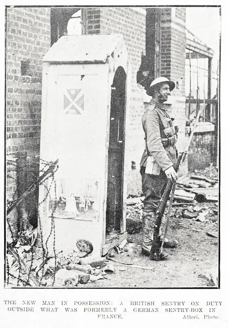 The new man in possession: a British sentry on duty outside what was formerly a German sentry-box in France