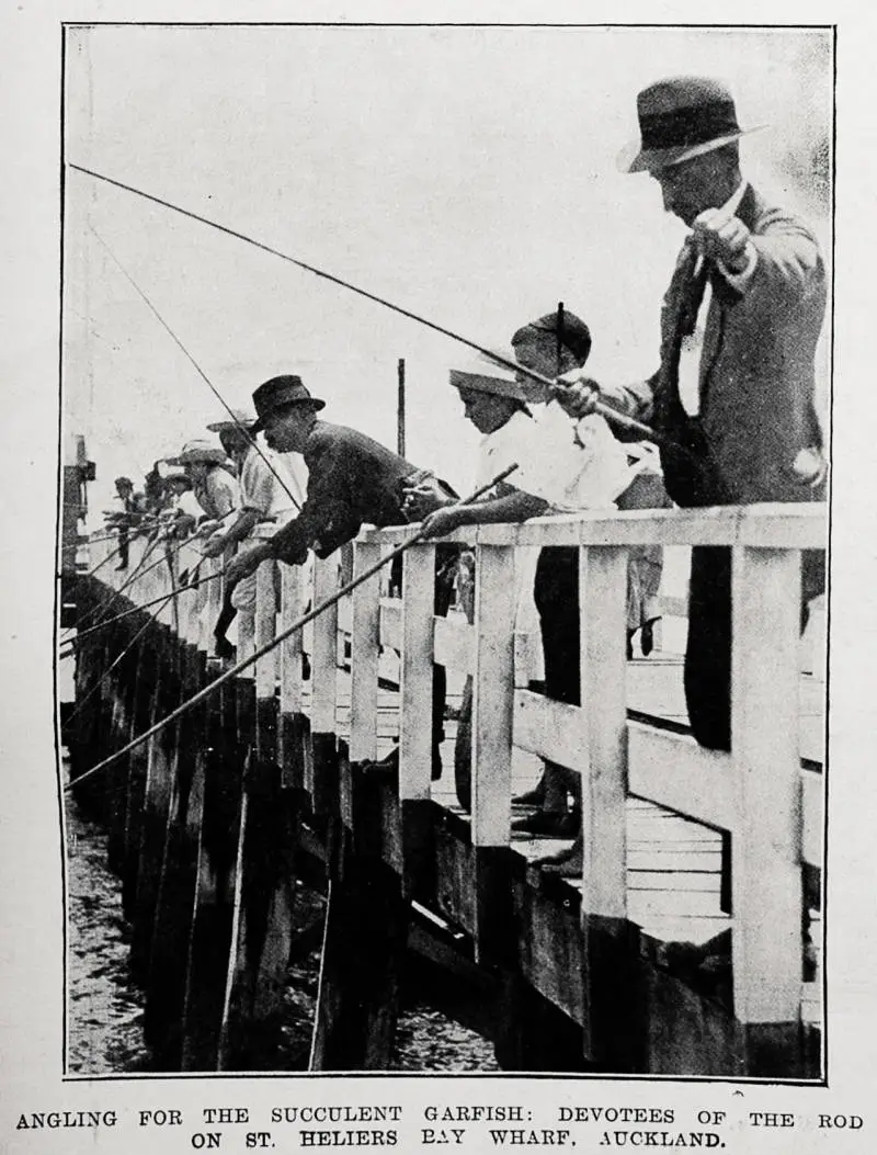 Angling for the succulent garfish: devotees of the rod on St. Heliers Bay Wharf, Auckland