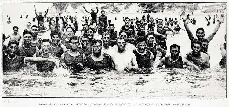 Merry Maoris and Niue islanders: troops disport themselves in the waves at Narrow Neck beach