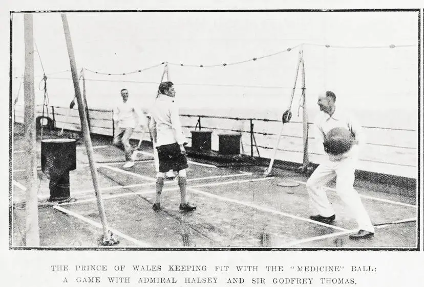The Prince of Wales keeping fit with the 'medicine' ball: a game with Admiral Halsey and Sir Godfrey Thomas