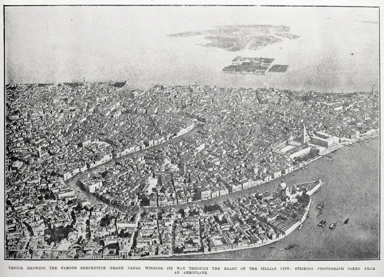 Venice, showing the famous serpentine Grand Canal winding its way through the heart of the Italian city: striking photograph taken from an aeroplane