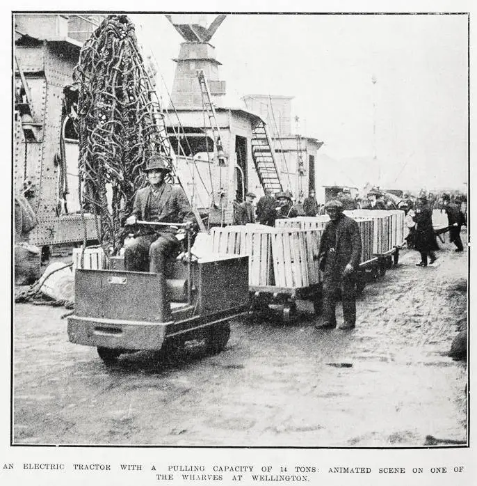 An electric tractor with a pulling capacity of 14 tons: animated scene on one of the wharves at Wellington