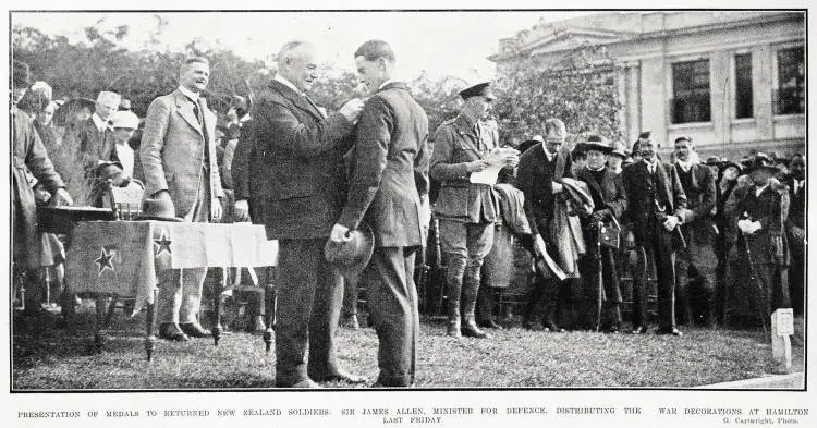 Presentation of medals to returned New Zealand soldiers: Sir James Allen, Minister for Defence, distributing the war decorations at Hamilton last Friday