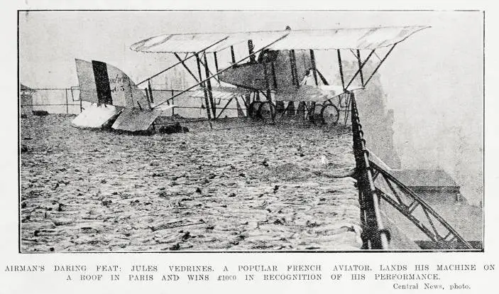 Airman's daring feat: Jules Vedrines, a popular French aviator, lands his machine on a roof in Paris and wins £1000 in recognition of his performance