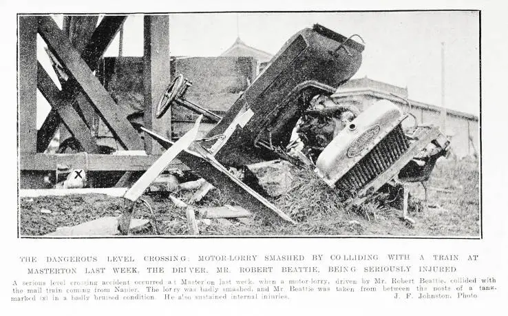 The dangerous level crossing: motor-lorry smashed by colliding with a train at Masterton last week, the driver, Mr. Robert Beattie, being seriously injured