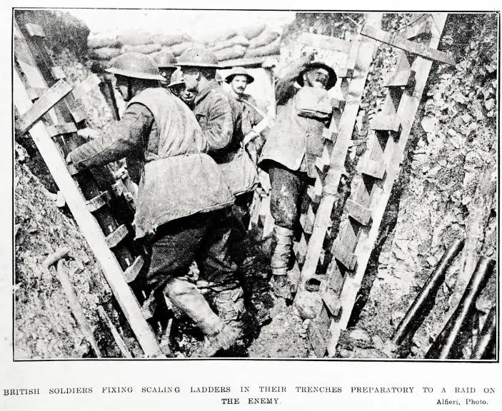 British soldiers fixing scaling ladders in their trenches preparatory to a raid on the enemy