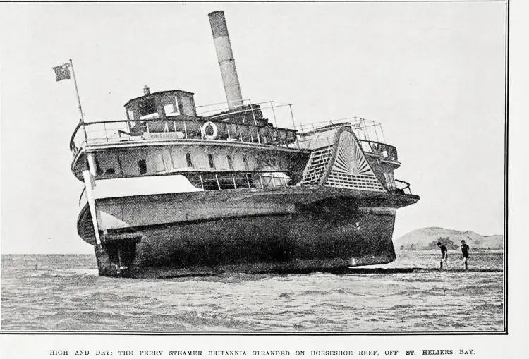 High and dry: the ferry steamer Britannia stranded on Horseshoe Reef, off St. Heliers Bay