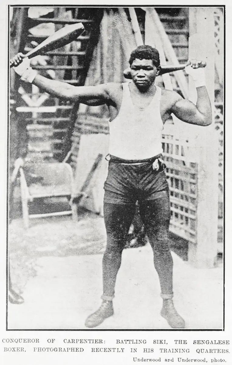 Conqueror of French boxer Georges Carpentier: Battling Siki, the Senegalese boxer, photographed recently in his training quarters