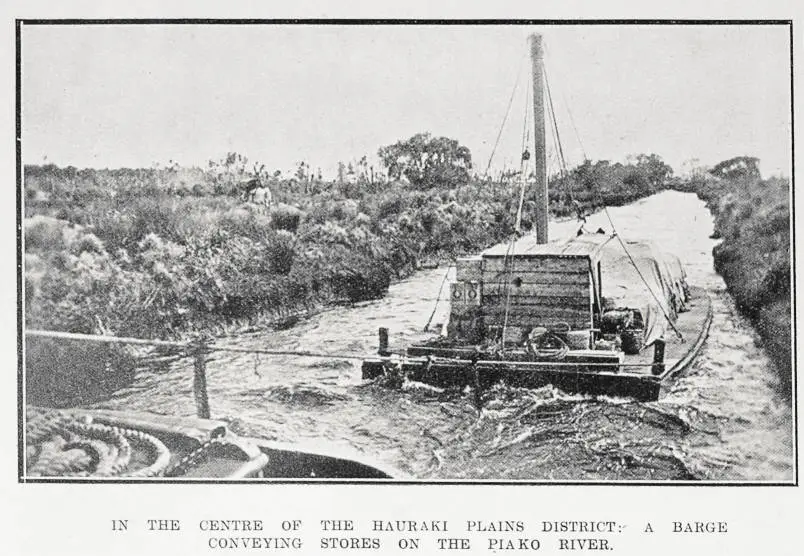 In the centre of the Hauraki Plains district: a barge conveying stores on the Piako River