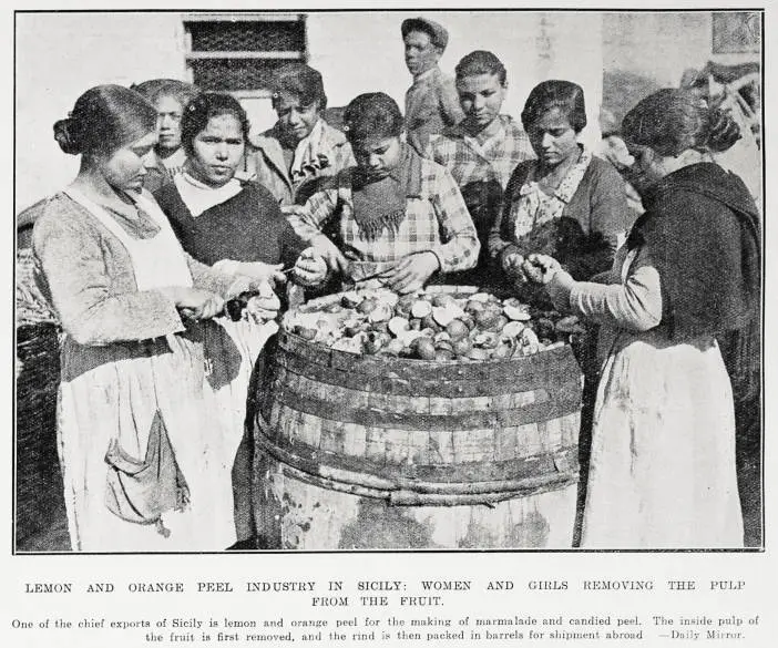 Lemon and orange peel industry in Sicily: women and girls removing the pulp from the fruit