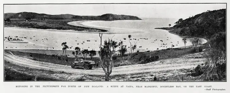 Motoring in the picturesque Far North of New Zealand: a scene at Taipa, near Mangonui, Doubtless Bay, on the East Coast