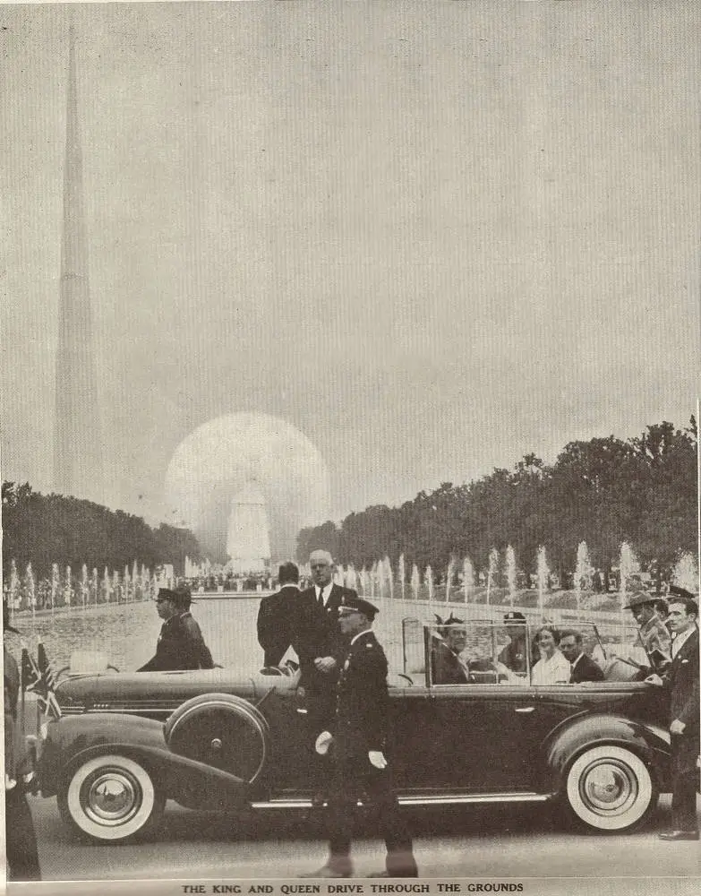 The King and Queen drive through the grounds