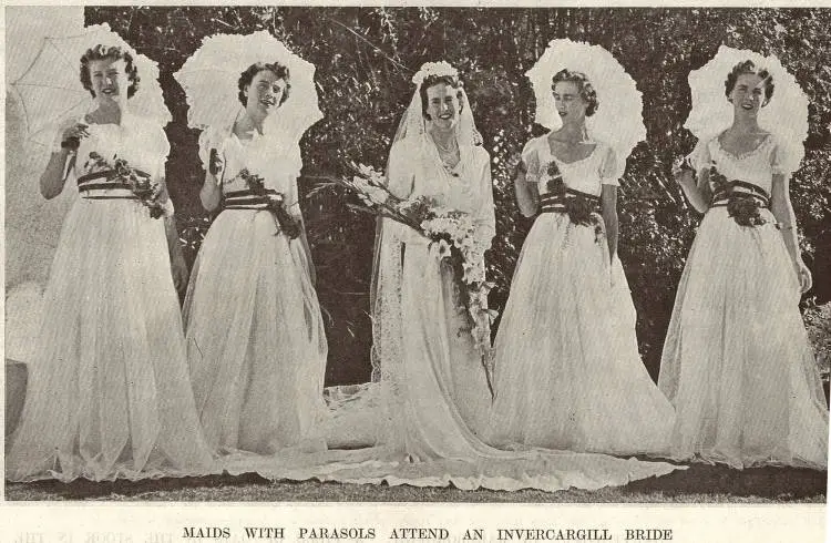 Maids with parasols attend an Invercargill bride