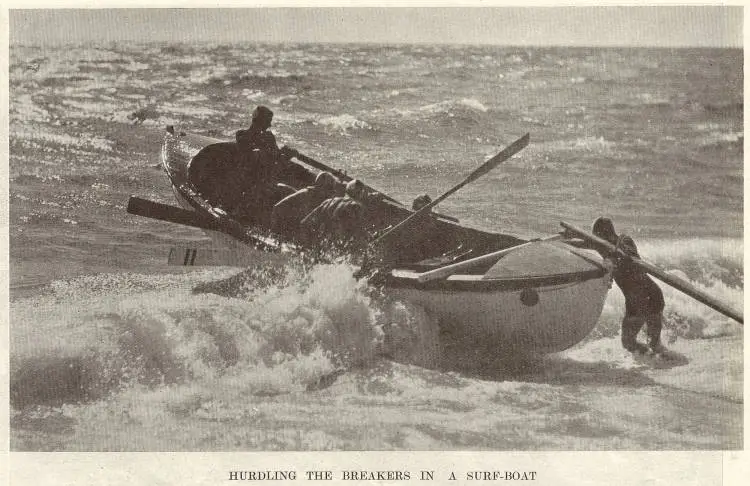 Hurdling the breakers in a surf-boat