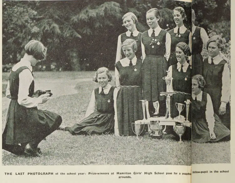 Prize-winners at Hamilton Girls' High School pose for a snapshot by a fellow-pupil