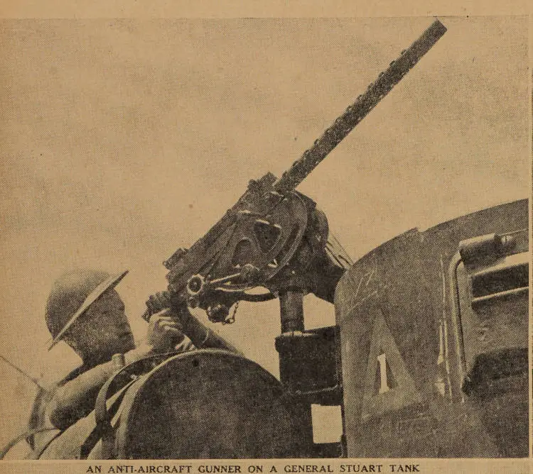 An anti-aircraft gunner on a General Stuart tank