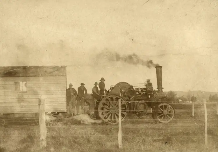 Traction engine pulling a shed on a trailer