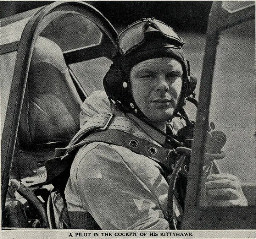 A pilot in the cockpit of his Kittyhawk