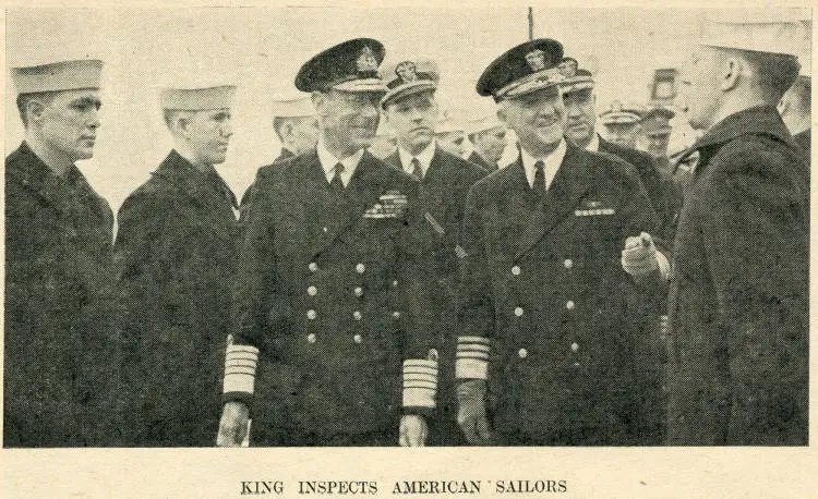 King inspects American sailors