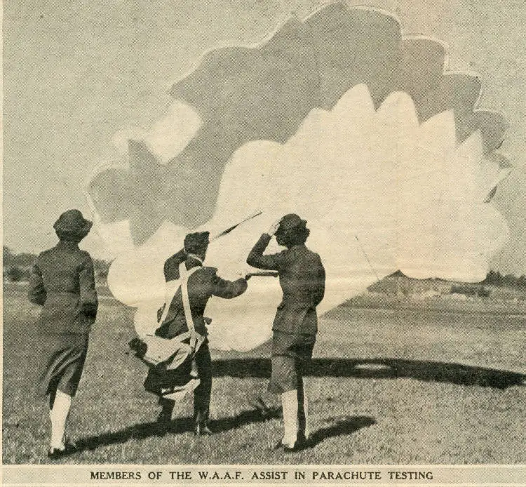 Members of the W. A. A. F. assist in parachute testing