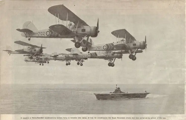 A squadron of Fairey-Swordfish torpedo-carrying bombers flying in formation after taking off from the aircraft-carrier Ark Royal