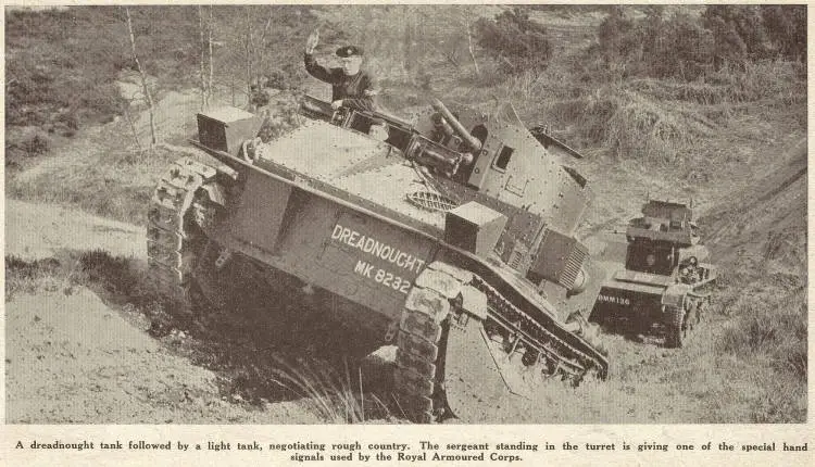 A dreadnought tank followed by a light tank, negotiating rough country