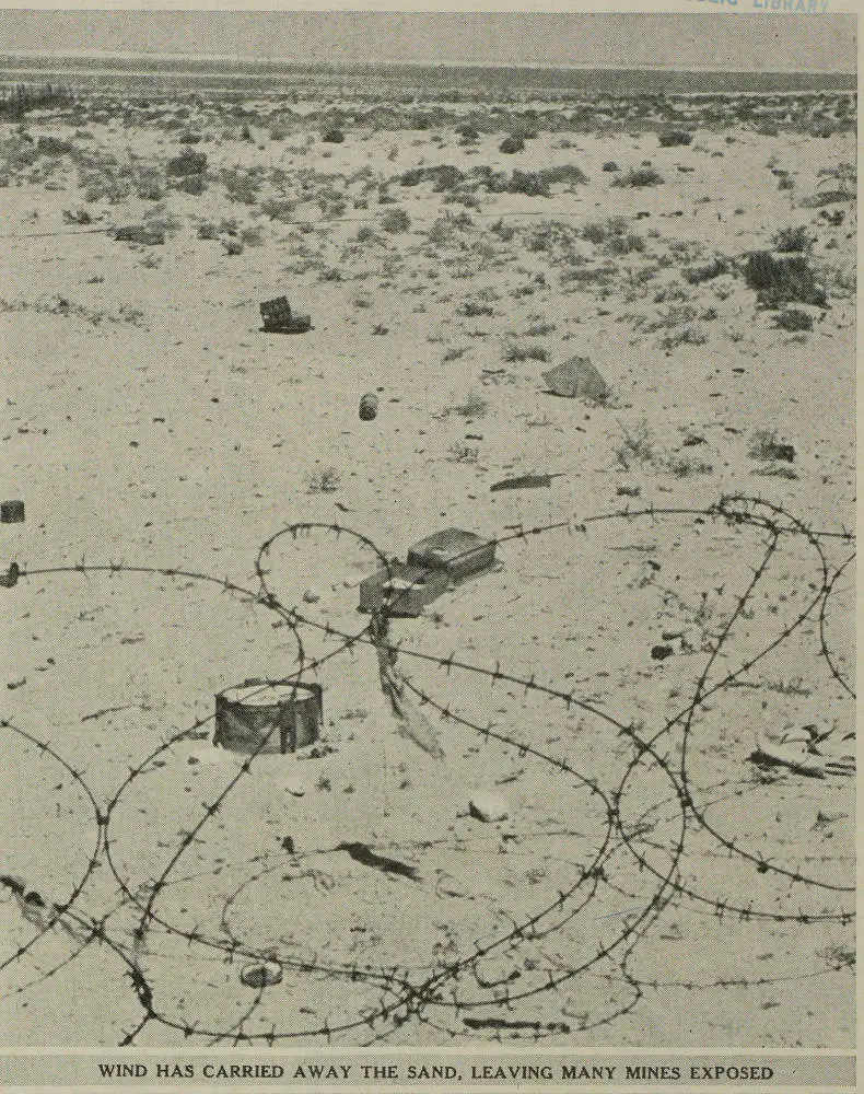 Wind has carried away the sand, leaving many mines exposed at El Alamein