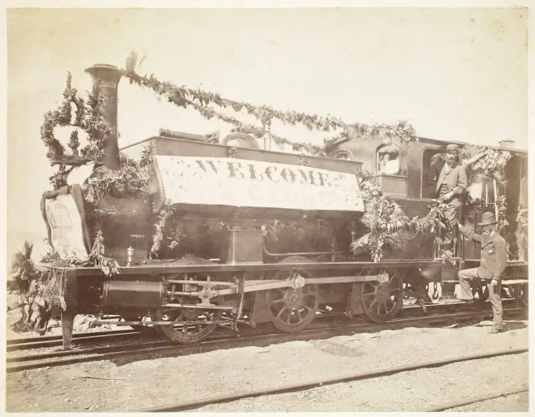 Decorated railway locomotive welcoming Sir George Grey