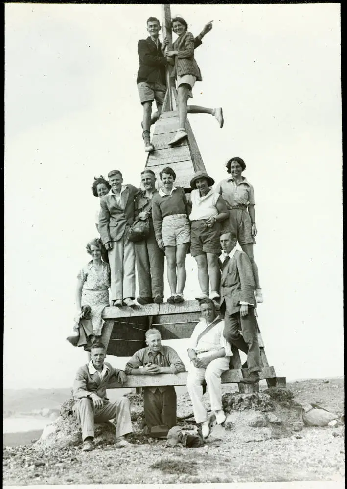 Group of trampers at the Rangitoto trig station, 1932