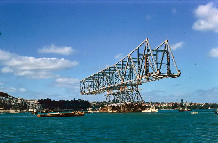 Moving the pick-a-back section of the Auckland Harbour Bridge into place, 1958