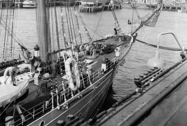 Esmeralda sailing ship showing the bow and ferry wharves in background.