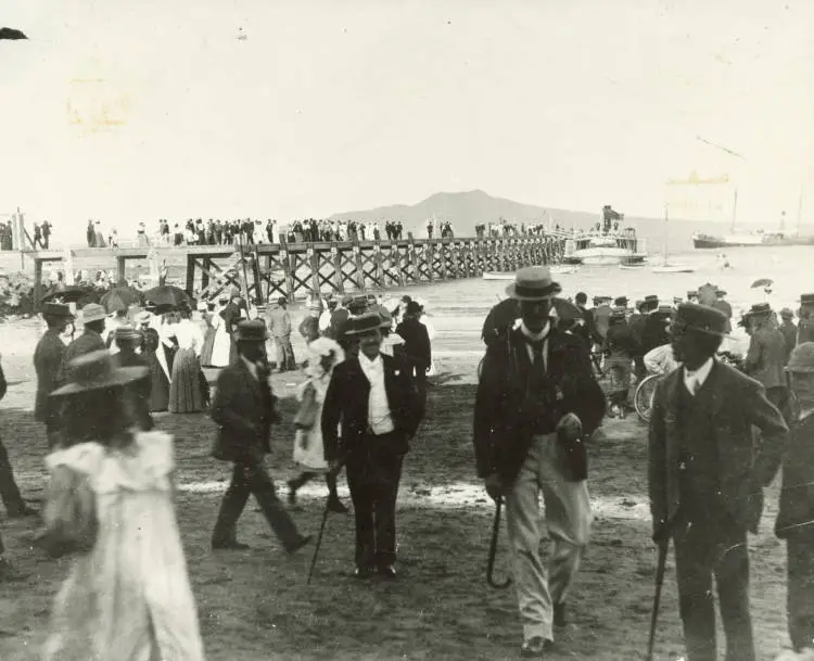 Passengers alight from a ferry at Takapuna Wharf.