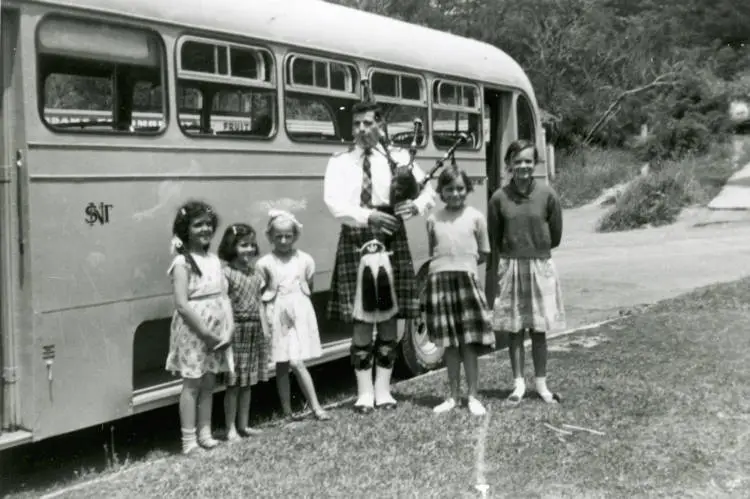 Bus driver Colin Corkery with his North Shore Transport bus, Castor Bay, North Shore.