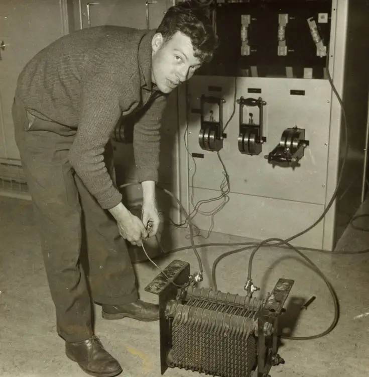 An electrician in the exchange, Ōtāhuhu, 1963
