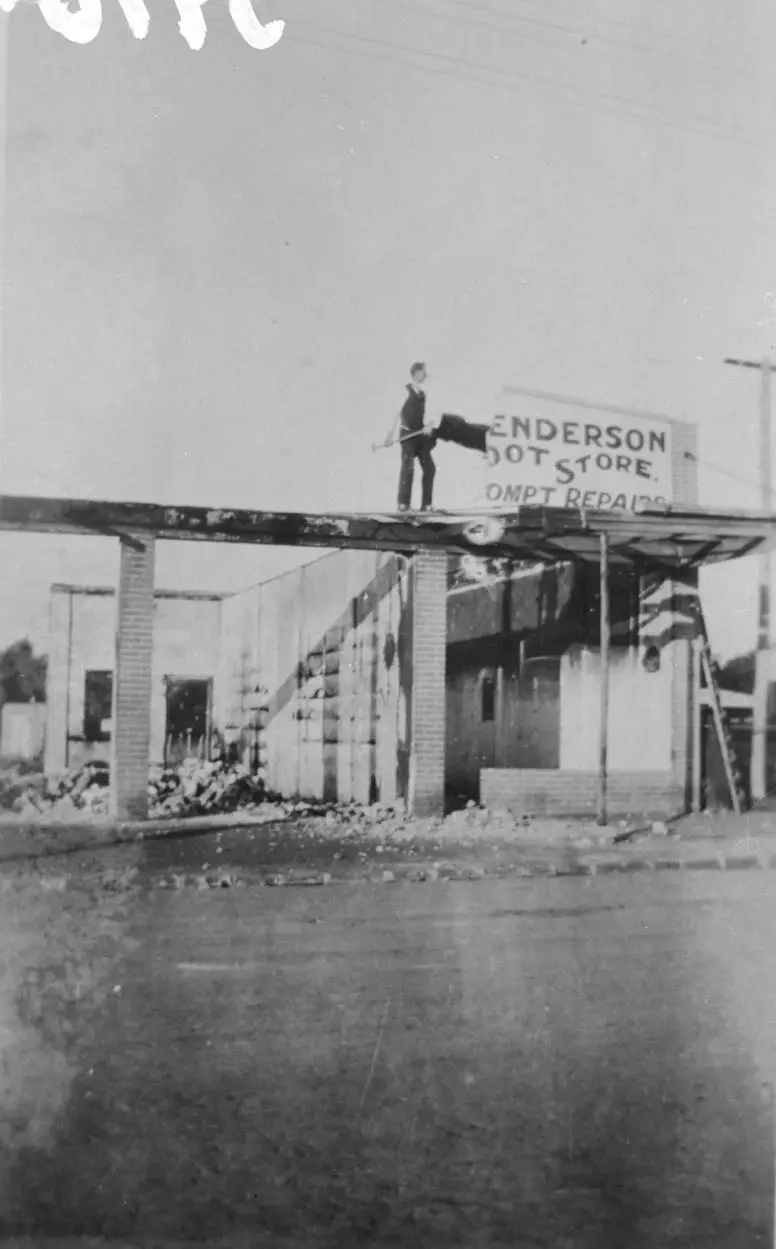 Demolition of Station Road shops after a fire, Henderson.