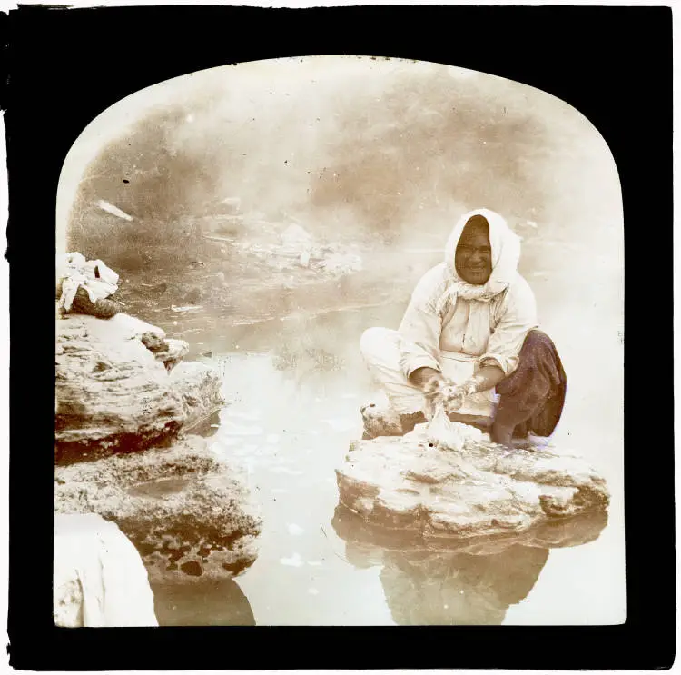 Māori woman washing clothes at Rotorua