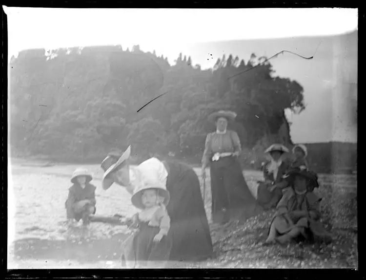 Women and children on a beach on the Manukau Harbour?
