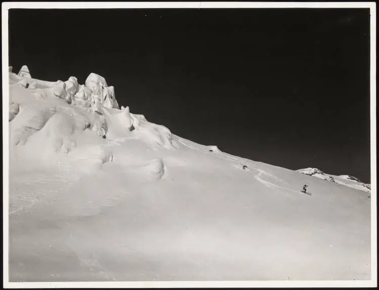 Two skiers at the head of the Tasman Glacier