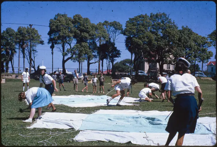 Sea-scouts putting up tents